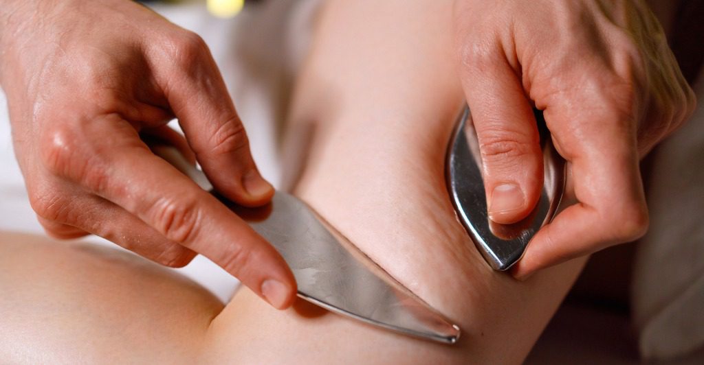 IASTM muscle scraping therapy